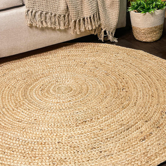 BRAIDED JUTE ROUND RUG, NATURAL JUTE, 4' ROUND.